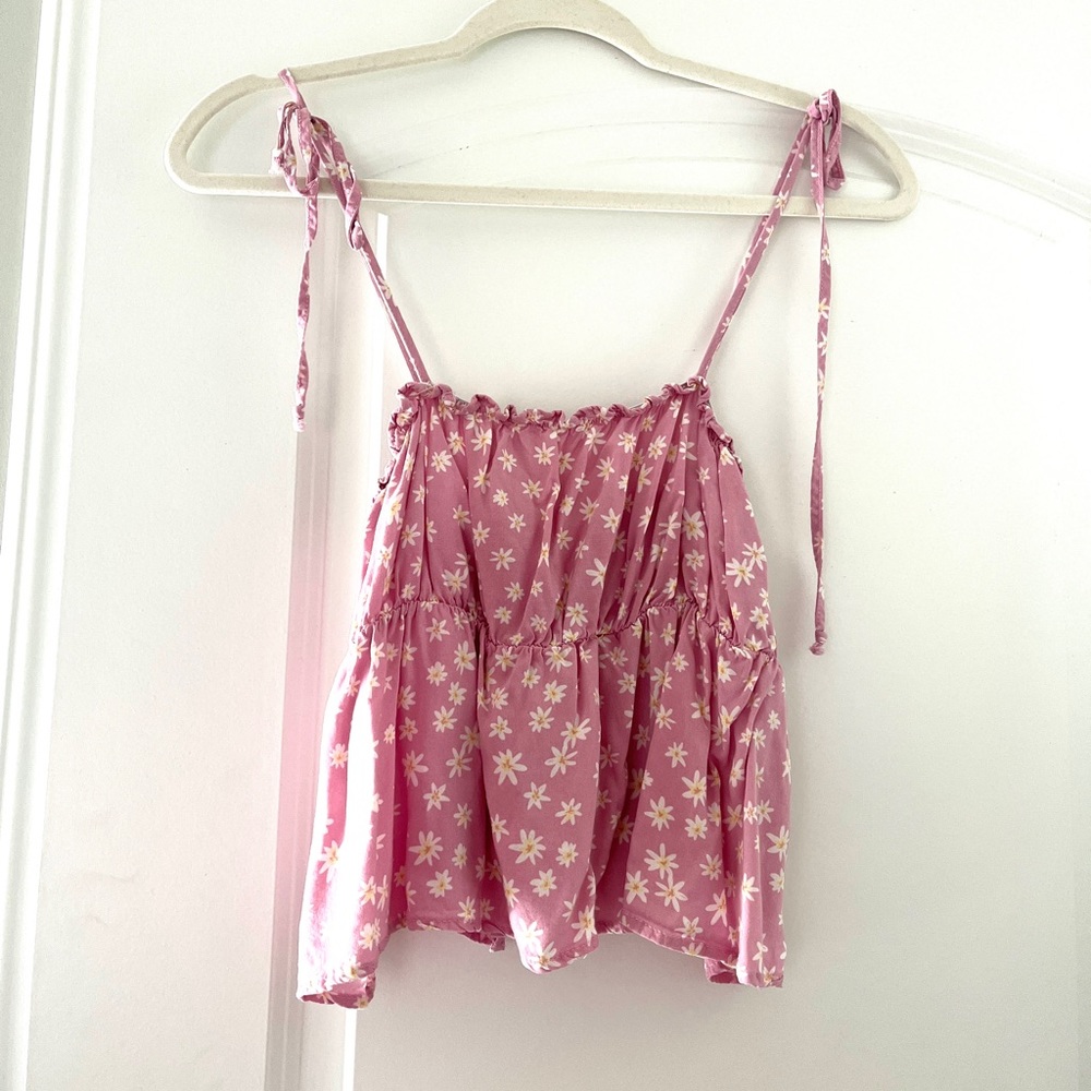 Pink floral, flowy tank top. Worn a couple of times, but in perfect condition!